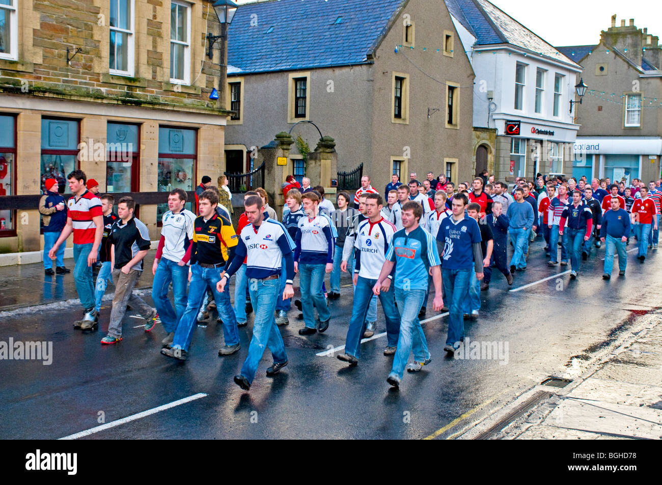 The Doonies Team approach the start of the Ba Game held in the streets each Christmas day in Kirkwall Mainland Orkney.  SCO 5830 Stock Photo