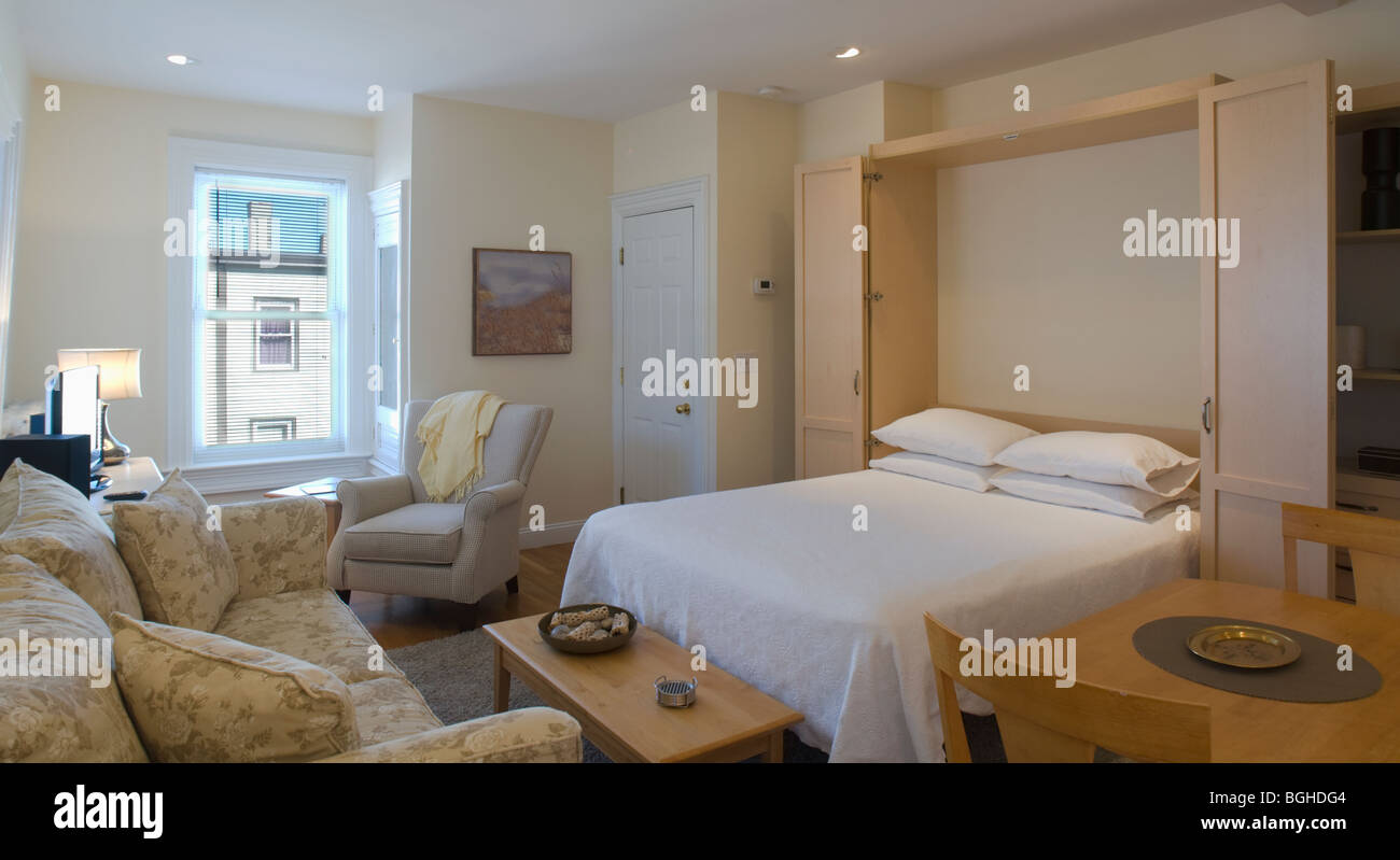 Murphy bed in studio apartment Stock Photo Alamy