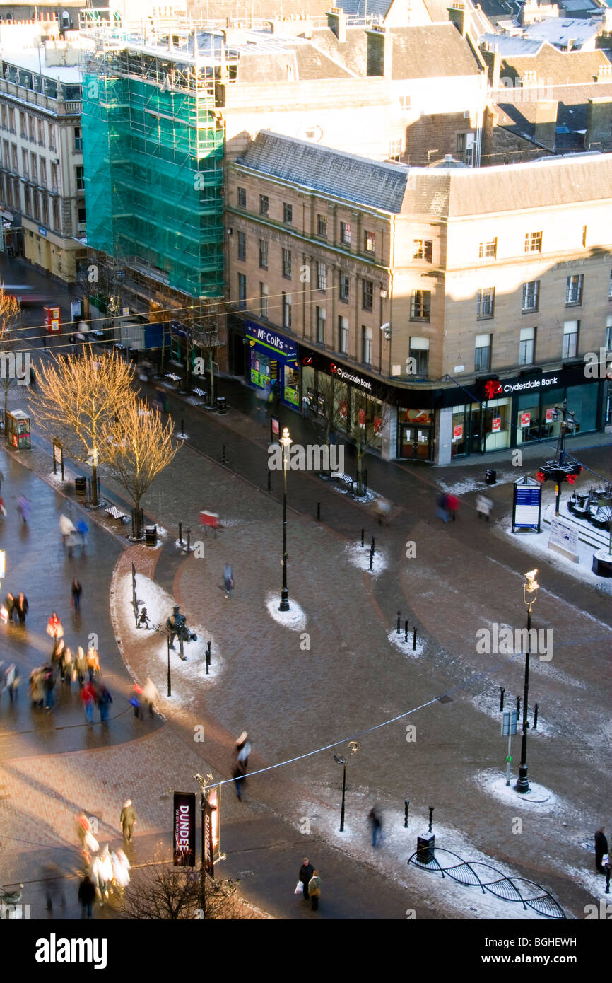 Aerial view of Dundee city centre and pedestrians walking on the icy cobbled streets in winter Stock Photo
