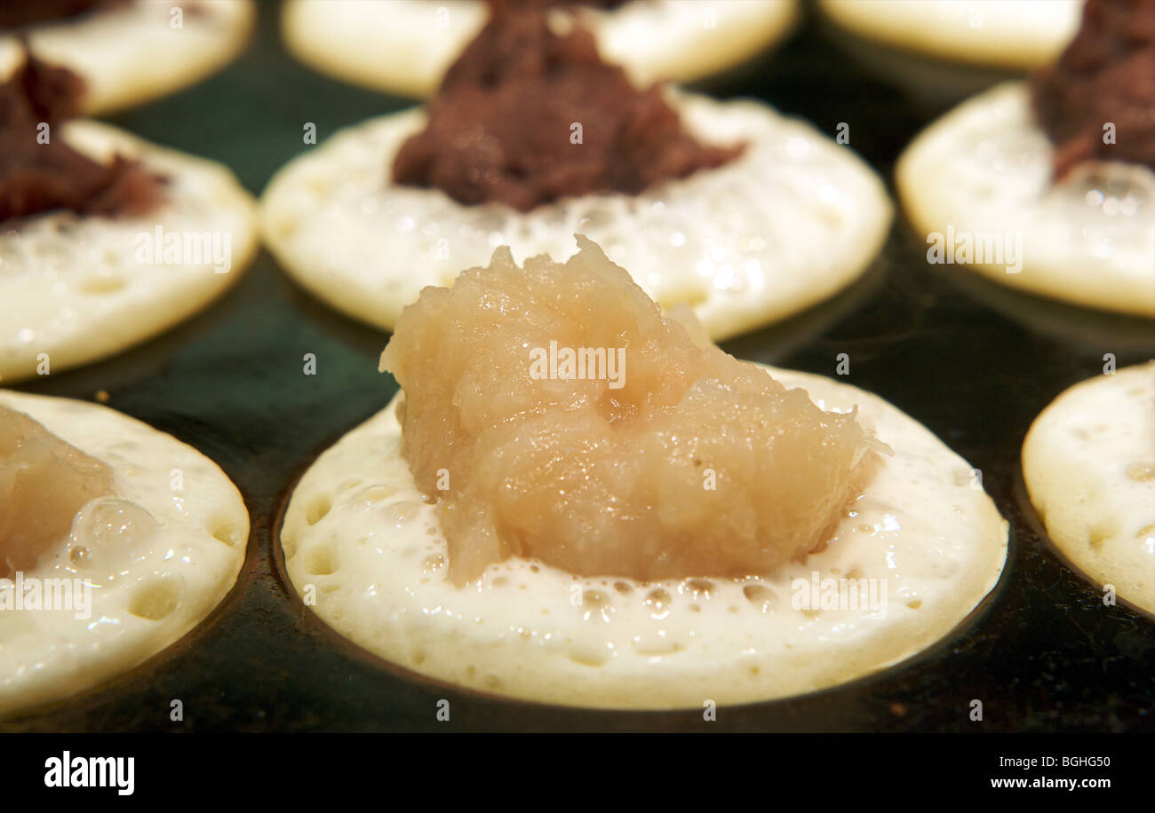 Japanese Wagashi confectionery being made with the filling exposed