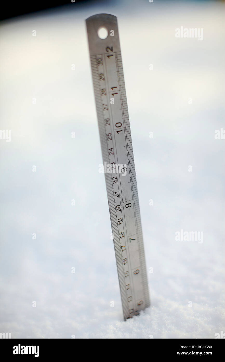 Measuring snow depth with ruler hires stock photography and images Alamy