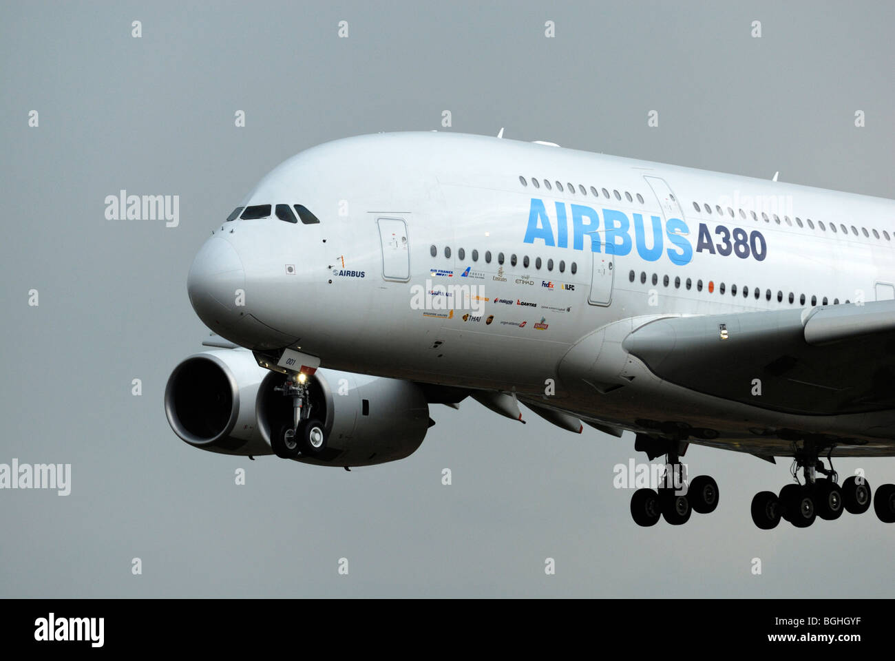 Airbus A380 in flight with landing gear down Stock Photo