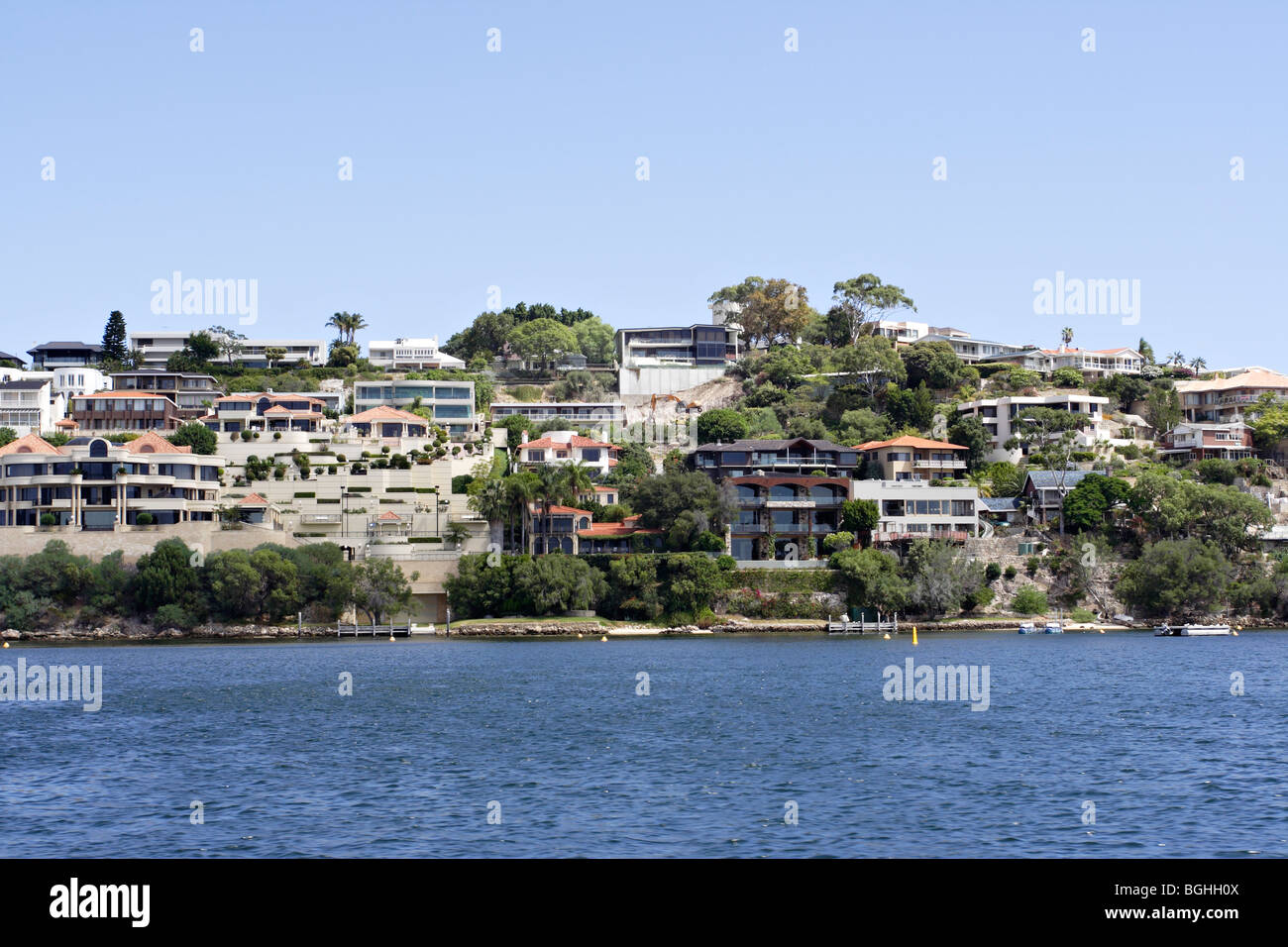 Luxury homes on the bank of Swan River between Perth and Fremantle in Western Australia. Stock Photo