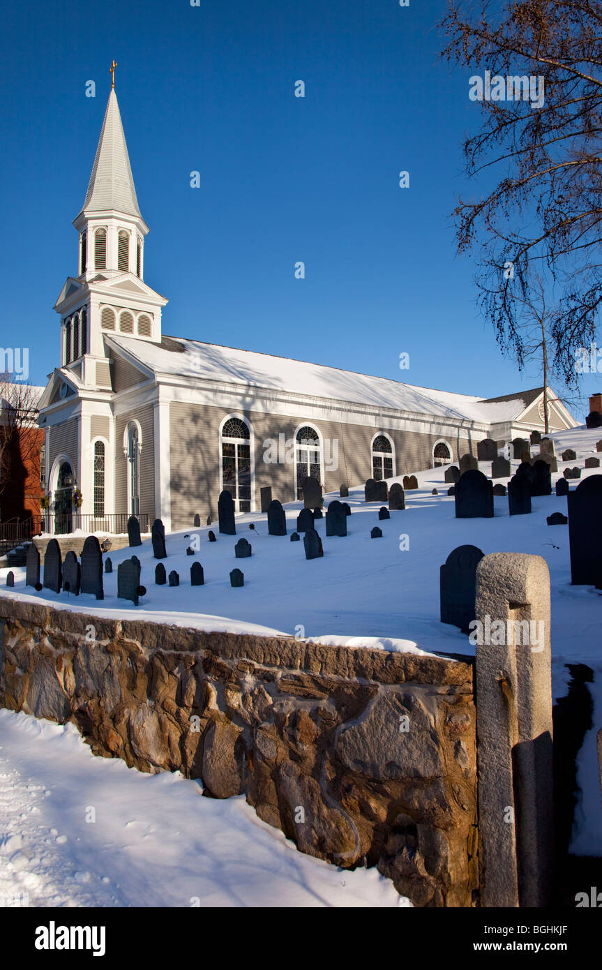 Winter at Saint Bernard Catholic Church with Old Hill Burying Ground - the oldest one in Concord Massachusetts USA Stock Photo