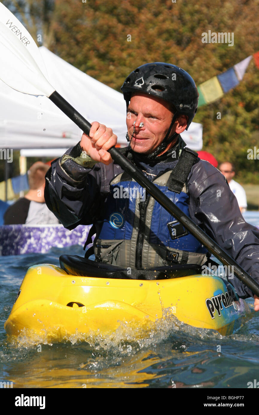 Kayak Demonstration at Gearfest, Eastwood Metropark, Dayton, Ohio, USA. Pyranha brand Kayak. Pro Tec brand Helmet. Stock Photo