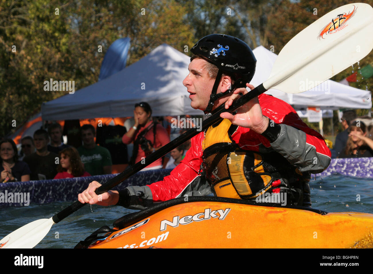 Kayak Demonstration. Necky brand Kayak. Aqua Bound brand paddle. Pro Tec brand helmet. Stock Photo