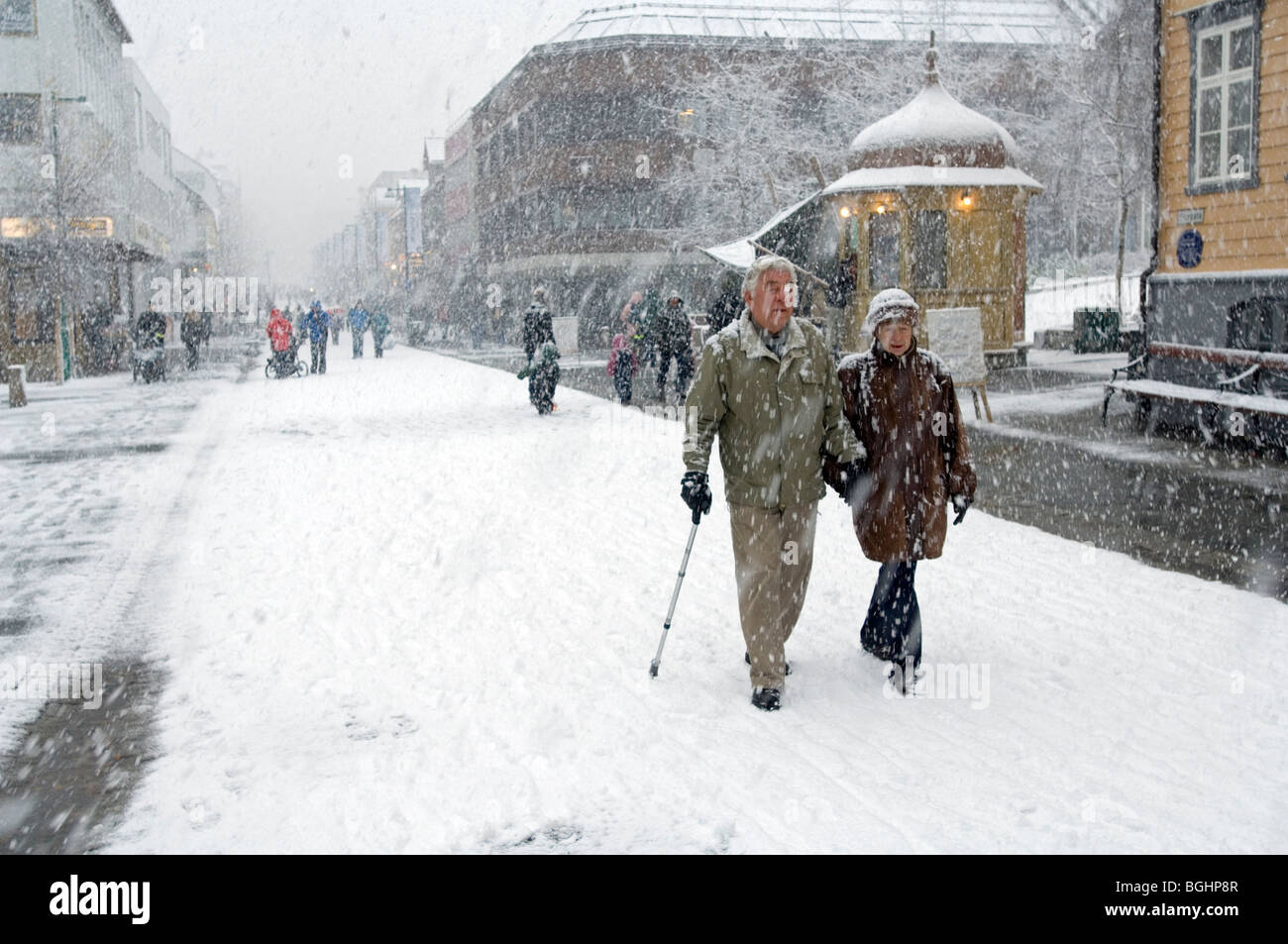 Woman walking on snowy hi-res stock photography and images - Alamy