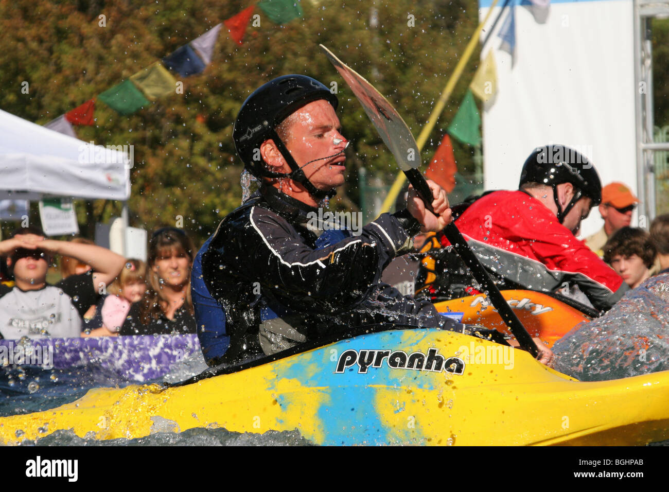 Kayak Demonstration at Gearfest, Eastwood Metropark, Dayton, Ohio, USA. Pyranha brand Kayak. Pro Tec brand Helmet. Stock Photo