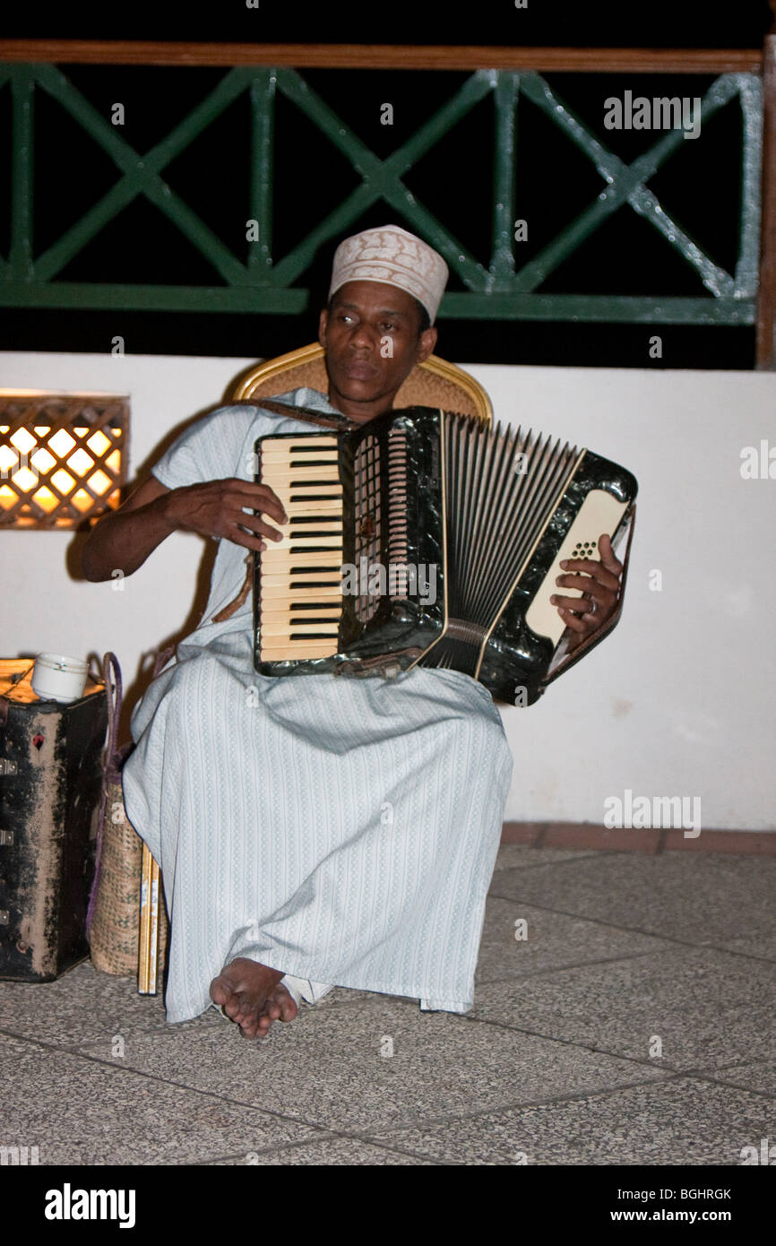 Zanzibar, Tanzania. Taarab Accordion Player, in Twinkling Star taarab group, part of Nadi Akhwan Safaa. Stock Photo
