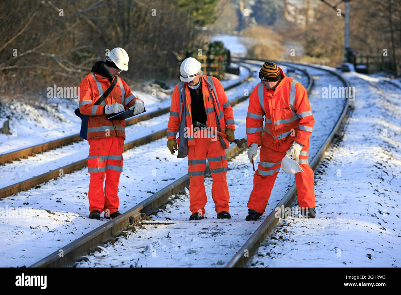 Men of Network SW Rail check the condition and temperatures of the