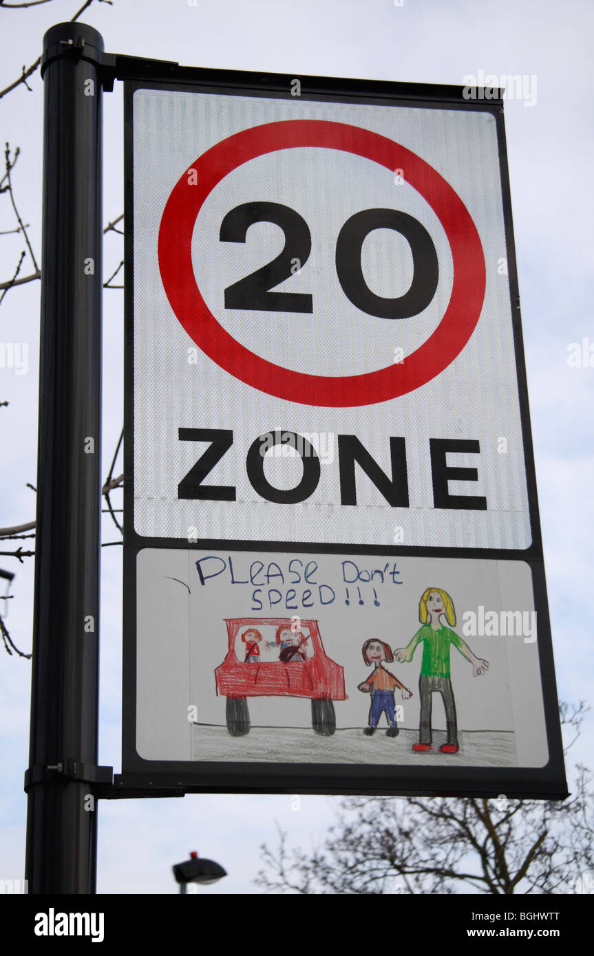 A 20mph Zone road sign in Hounslow, Middx, UK with a children's drawing to emphasis to dangers of driving too quickly. Stock Photo