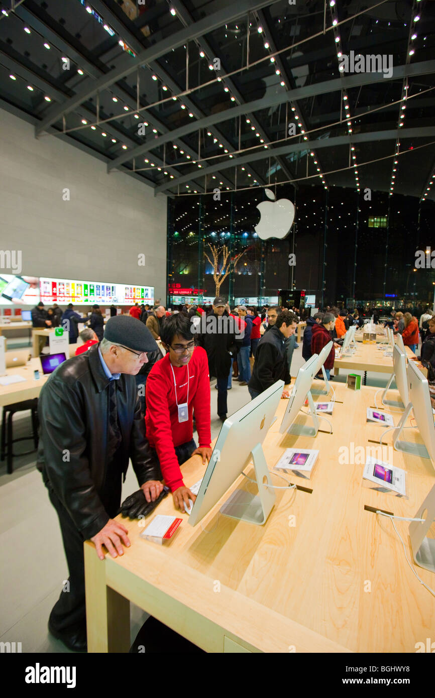 Salespeople and Customers at an Apple Store Looking at the Latest Apple  Products for Sale Editorial Stock Photo - Image of american, international:  203627338