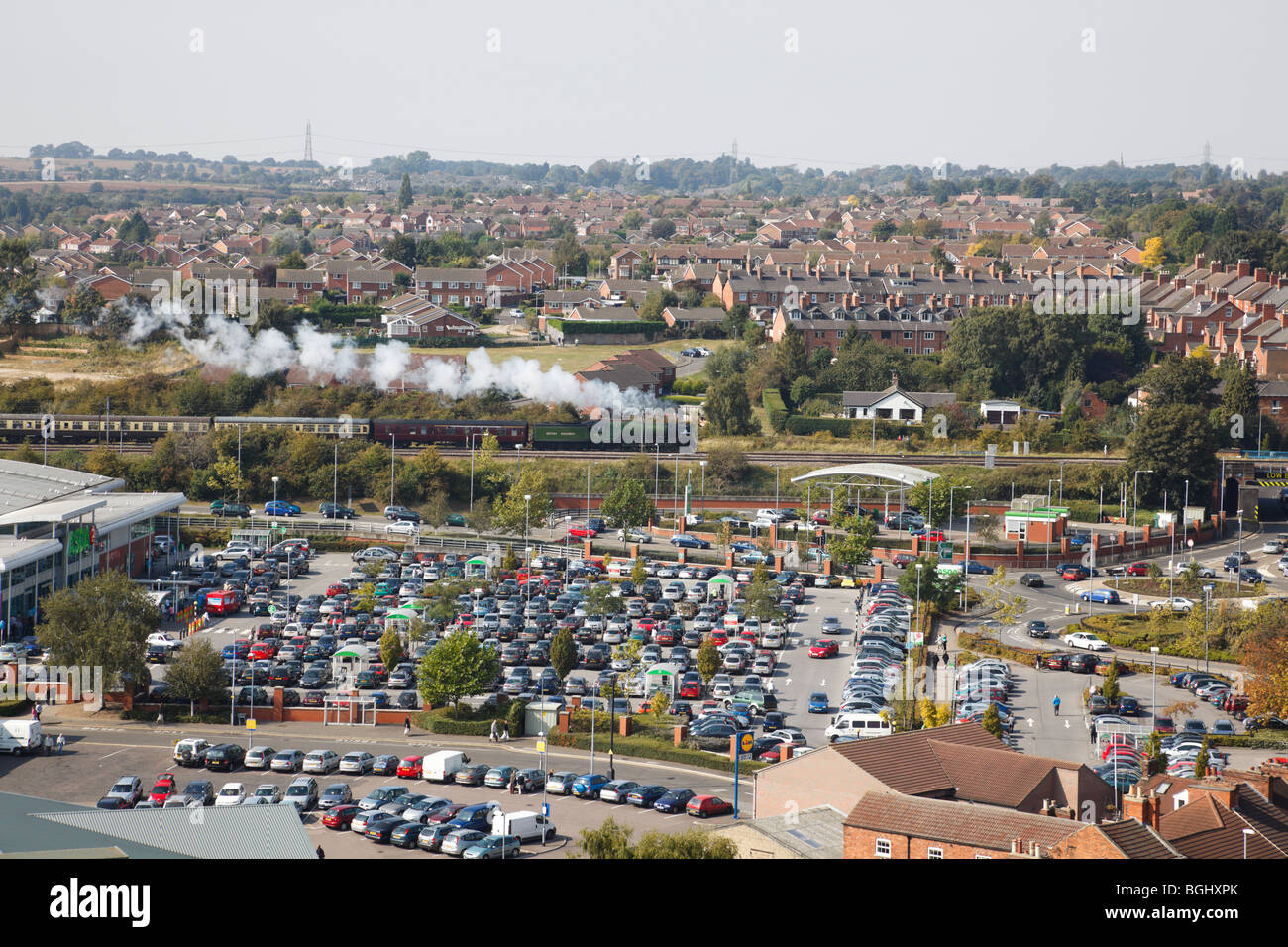 Aerial veiw over Grantham Asda supermarket, with the 'Tornado' steam train in the background. Stock Photo