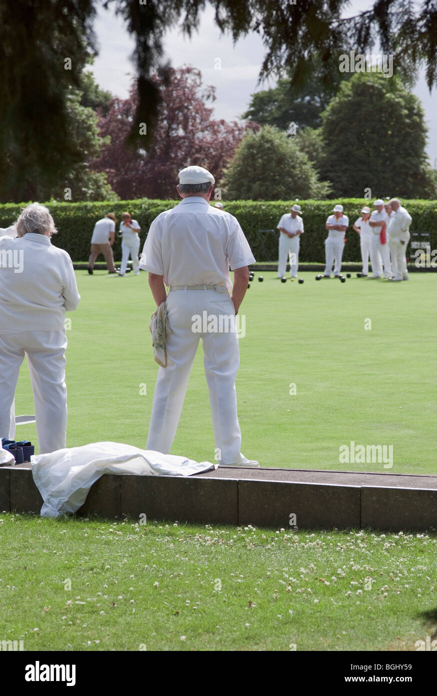 people playing bowls on a bowling green Stock Photo