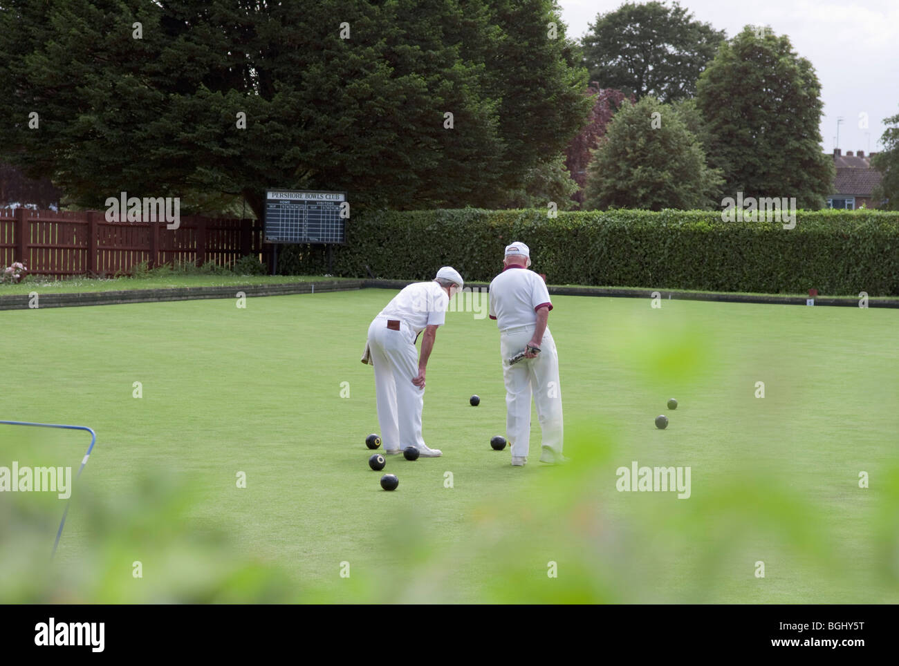 people playing bowls on a bowling green Stock Photo