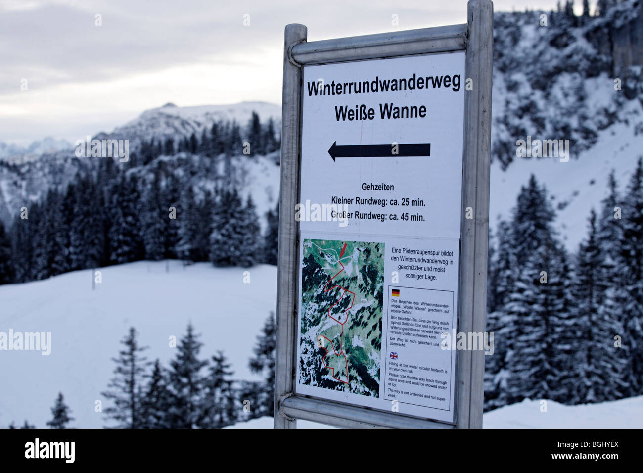 A sign advertising a winter adventure pathway on the Kampenwand, Chiemgau Upper Bavaria Germany Stock Photo