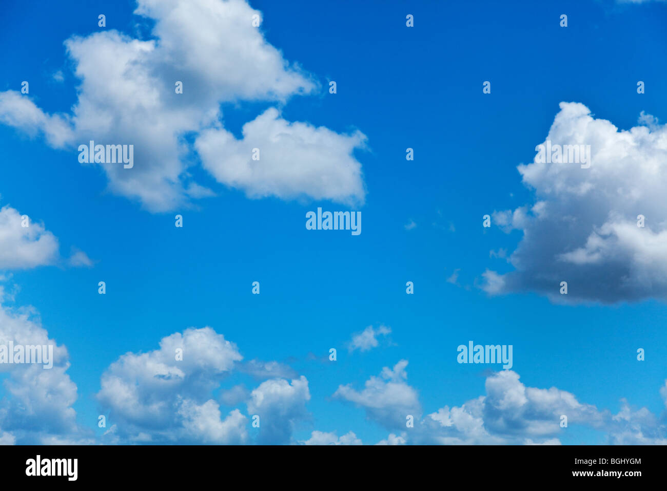 blue sky with fluffy white clouds on a sunny day Stock Photo - Alamy