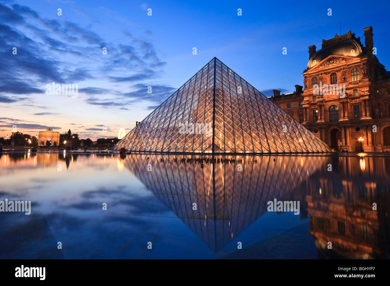 Louvre pyramid sunset hi-res stock photography and images - Alamy