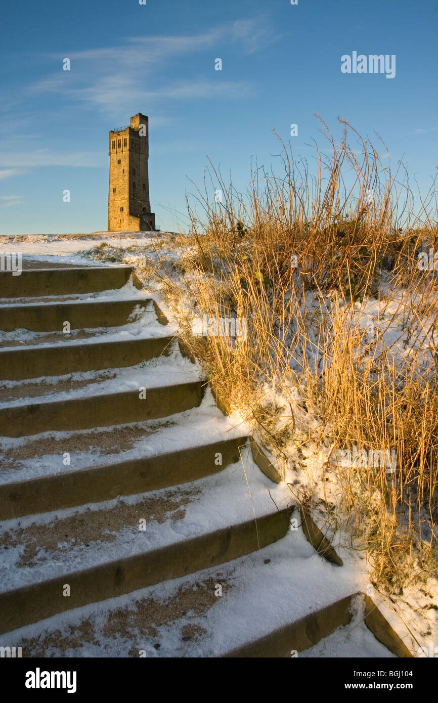Snow covers the steps that lead up to Victoria Tower, on Castle Hill, which over looks Huddersfield, West Yorkshire Stock Photo