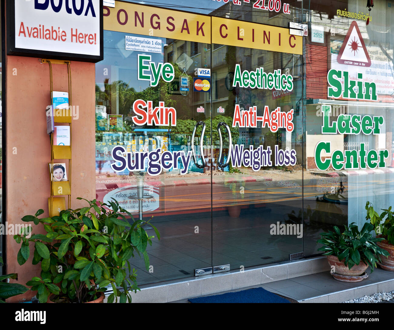 Skin care and beauty clinic frontage and shop window advertising, Thailand S. E. Asia Stock Photo