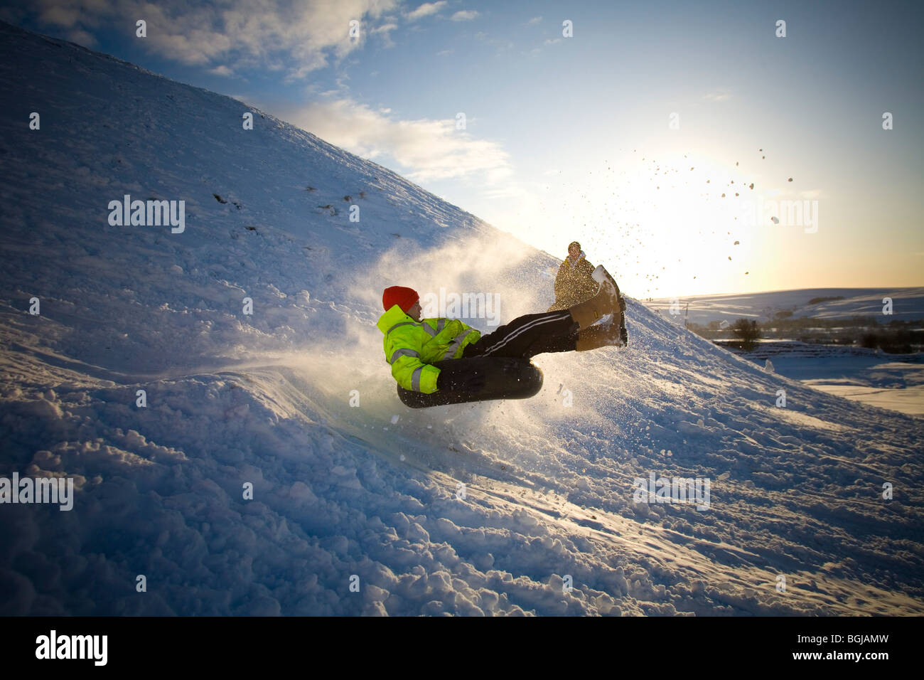 Sliding down a hill hires stock photography and images Alamy