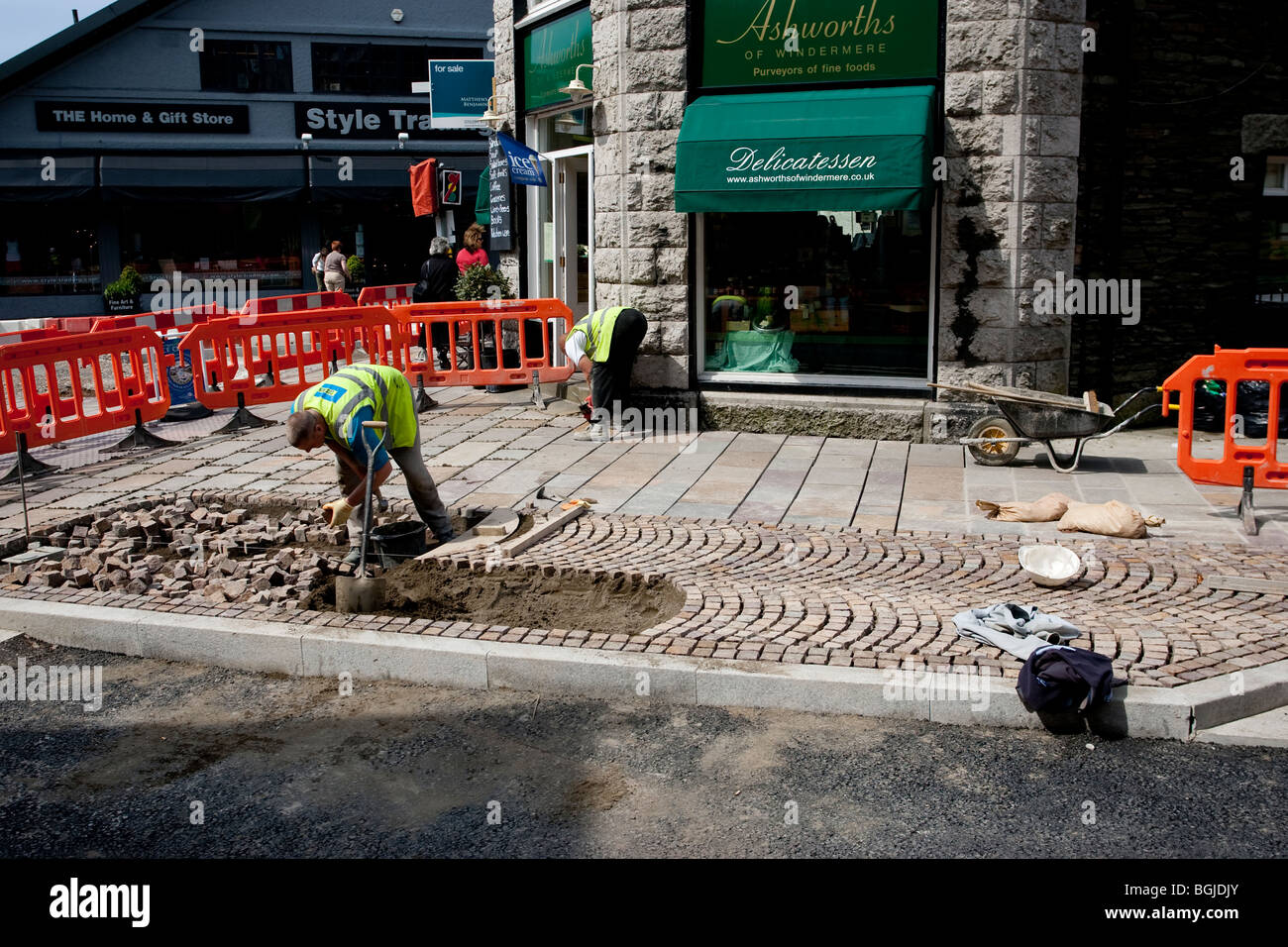 Modern cobblestone being laid Stock Photo