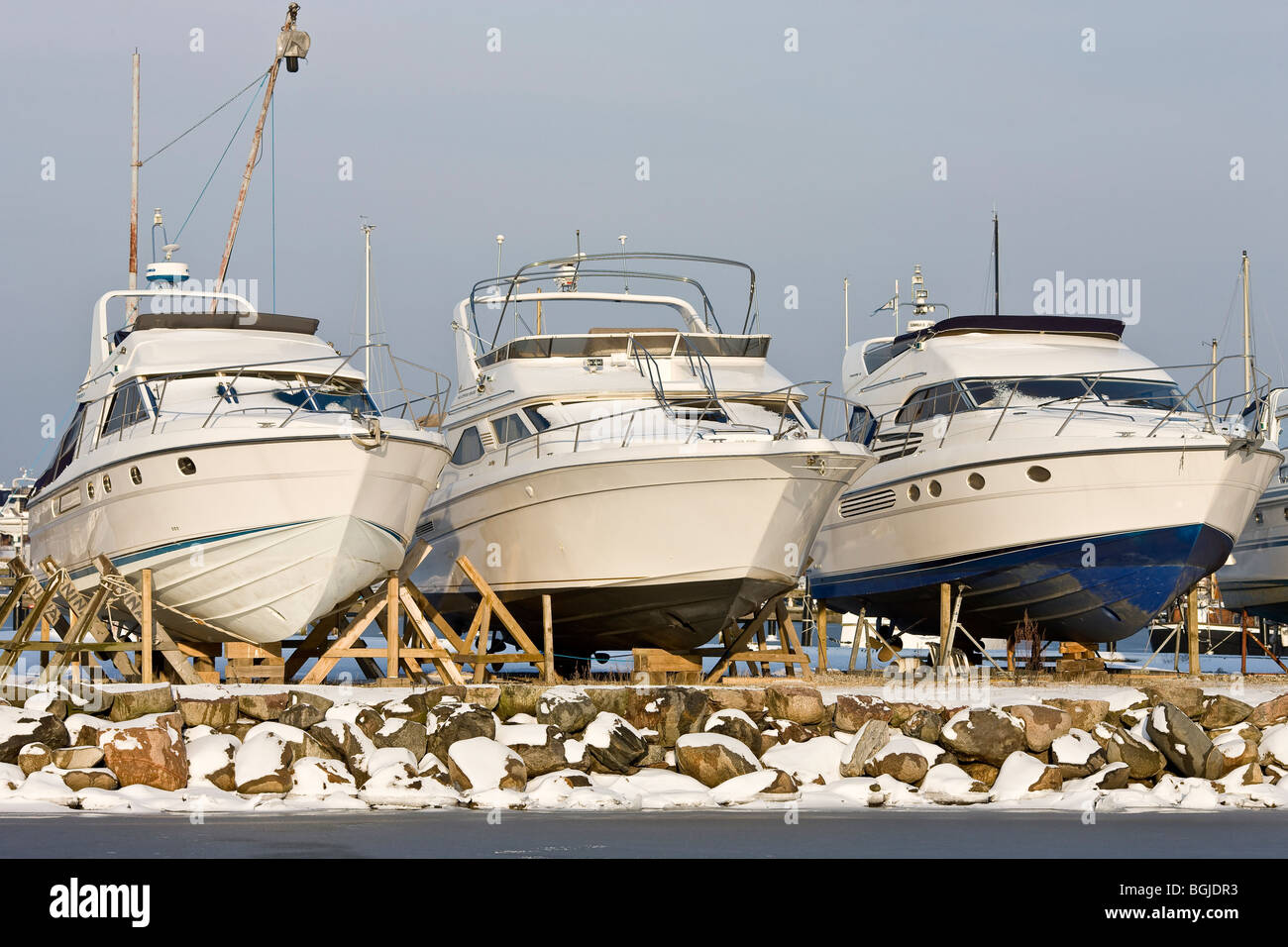 Three drydocked motor boats in Dragoer harbour Stock Photo