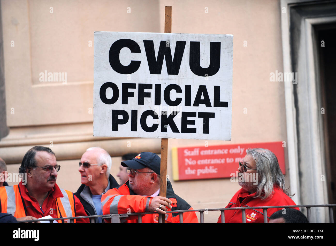 Workers from Royal Mail on their picket line outside the sorting office