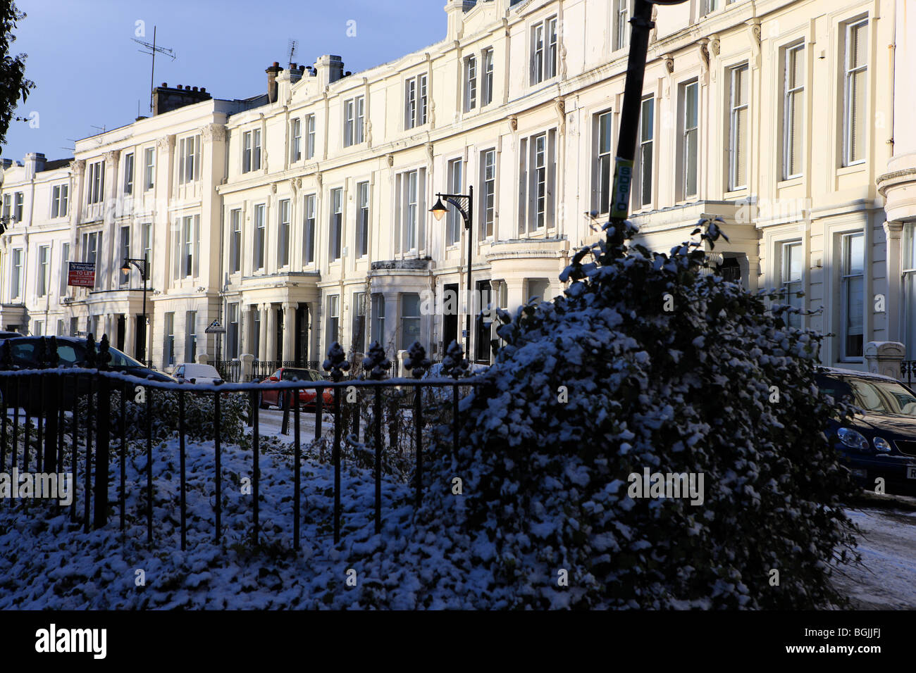 Glasgow Victorian terrace housing with garden covered in snow Stock Photo