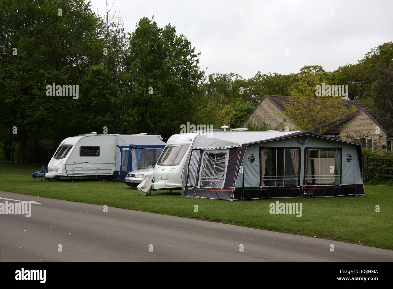 Caravans with erected awnings on Caravan Club site , Burford