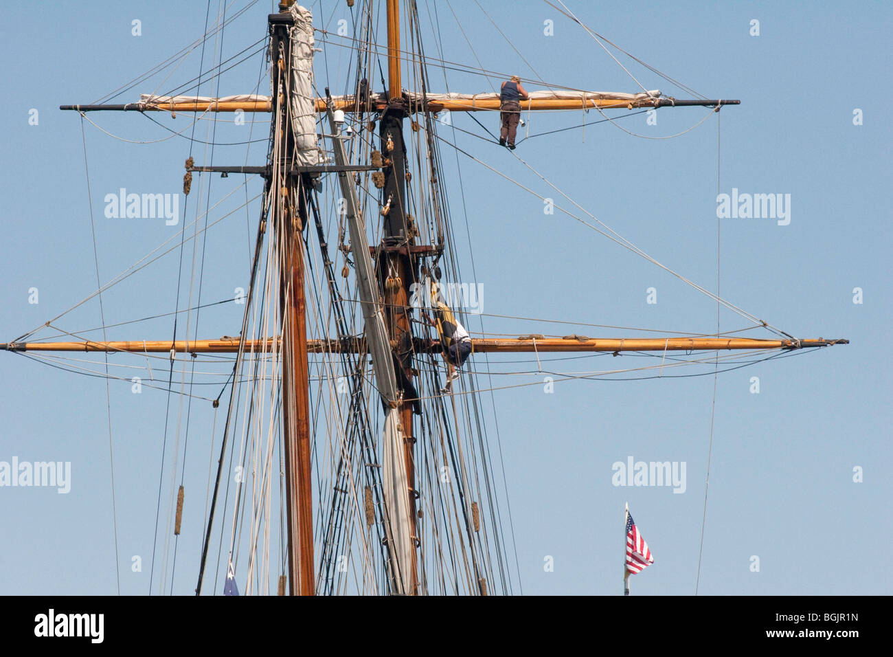 Working Aloft aboard PRIDE OF BALTIMORE II Stock Photo