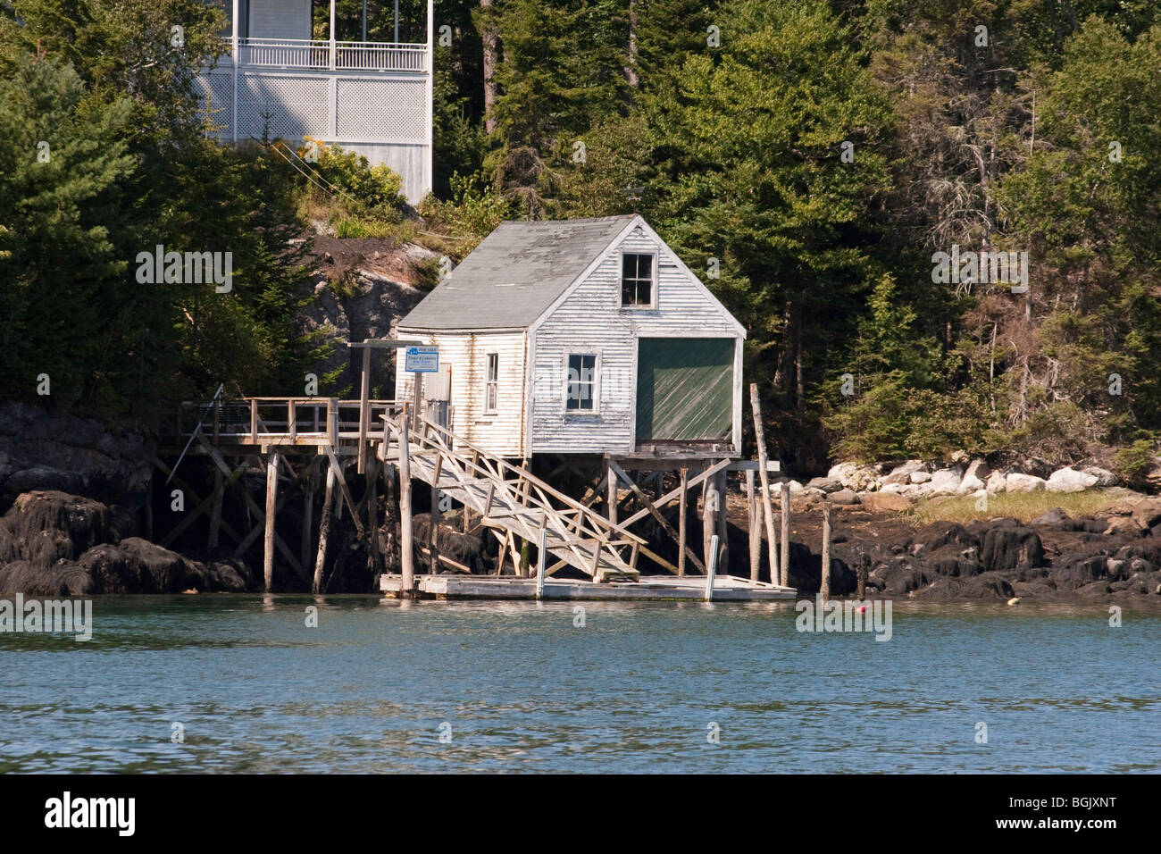 Waterfront boathouse in Maine Stock Photo