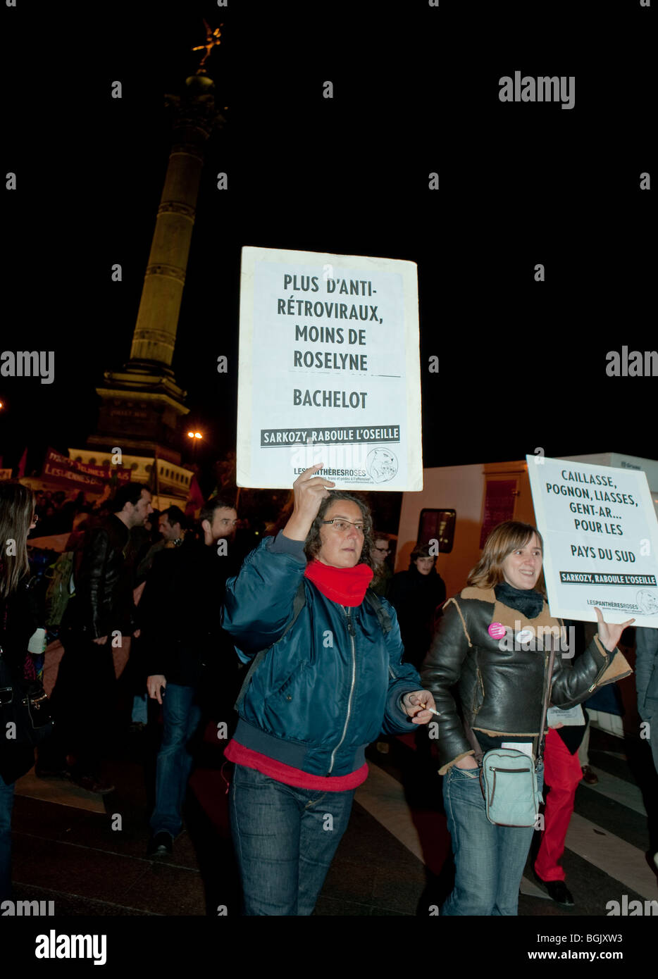 Paris, France, AIDS Activists of Pink Panthers and other Anti-AIDS Groups, Protesting Against AIDS at December 1, 'World AIDS Day' Women carrying protest Signs Stock Photo