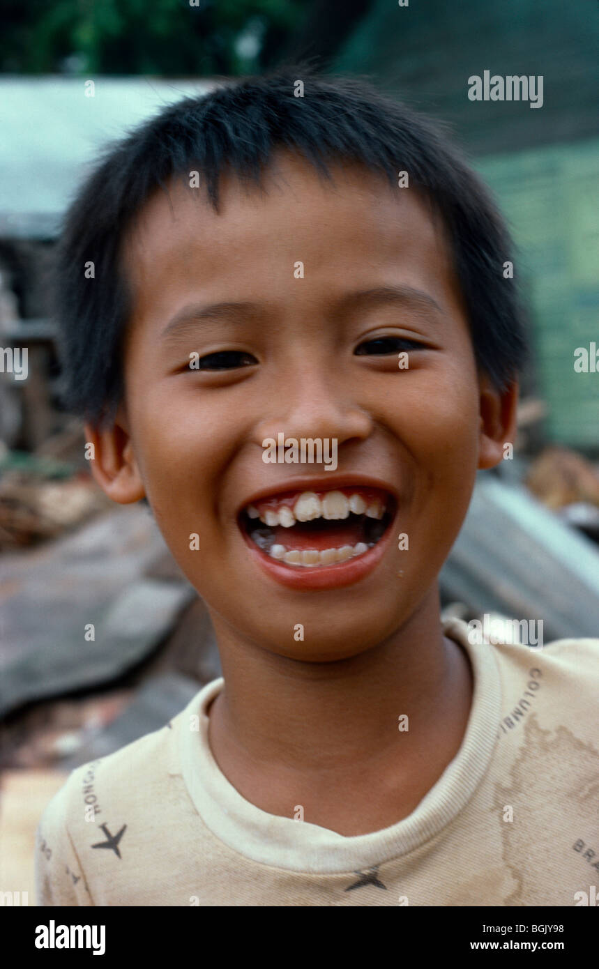Malaysia Portrait Of Boy Laughing Stock Photo - Alamy