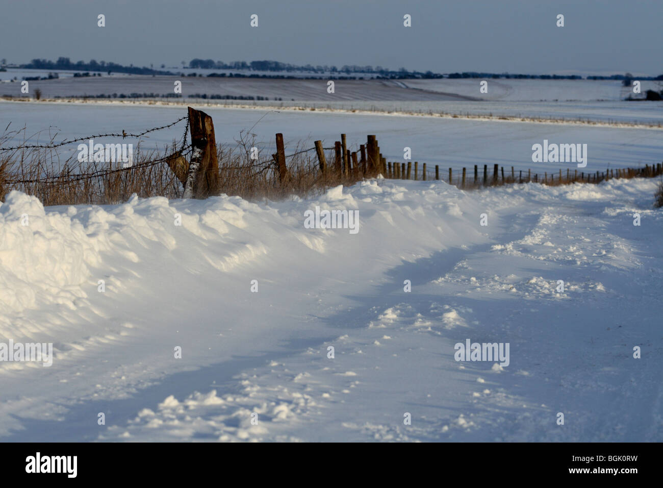 Imber Range Perimeter Path in the snow, Wiltshire, England, UK Stock Photo