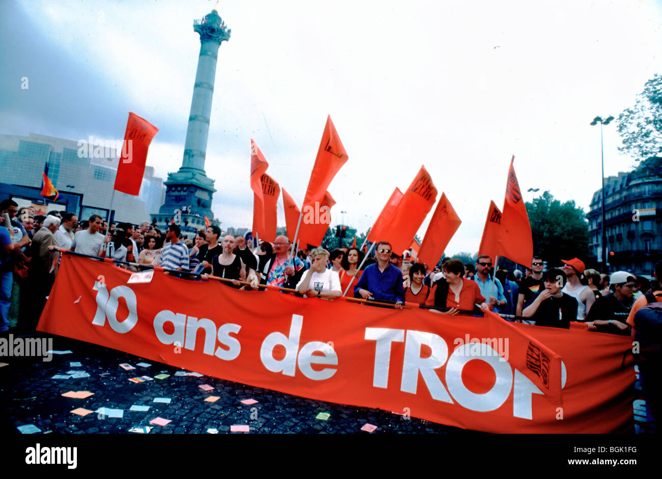 Paris, France - Group AIDS Activists of Act Up-Paris Protesting at Gay Pride March, for their 10th Anniversary march banner 1990's LGBT gay rights struggle, 1999 Stock Photo