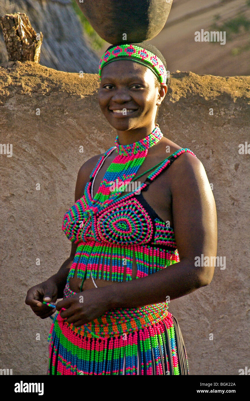 Zulu woman in beaded dress, Shakaland, South Africa Stock Photo