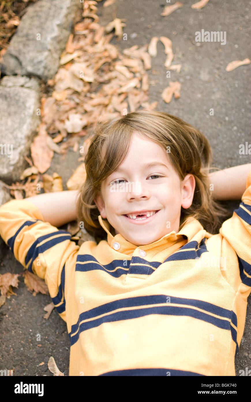 boy lying down looking up Stock Photo