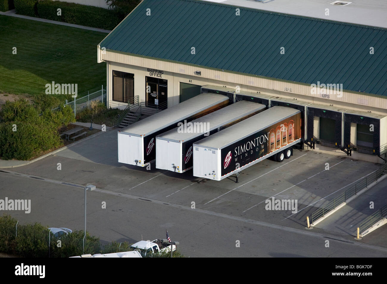 aerial view above Simonton Windows truck trailers warehouse Vacaville