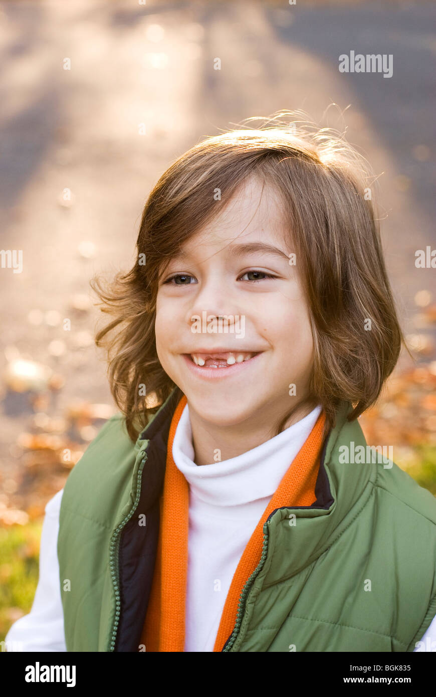 boy smiling with missing teeth Stock Photo