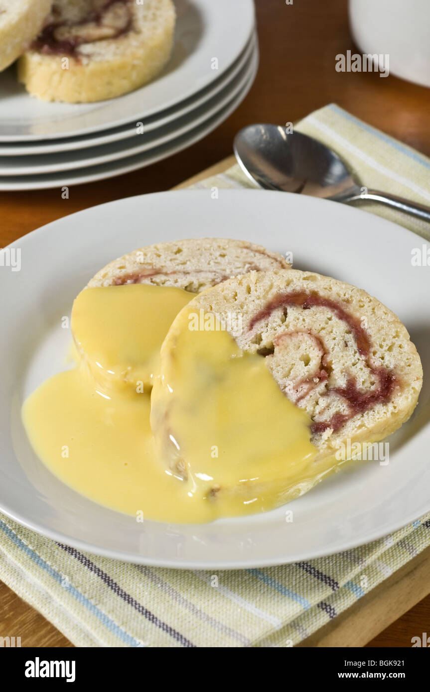 Jam roly poly pudding Stock Photo Alamy