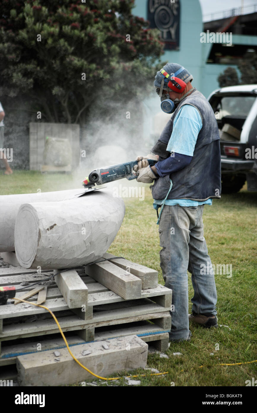 Artist makes stone sculpture New Plymouth, New Zealand Stock Photo