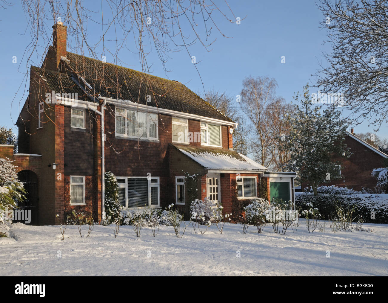1960’s suburban detached four bedroomed house Lichfield Staffordshire on snowy winter’s day 2010 Stock Photo
