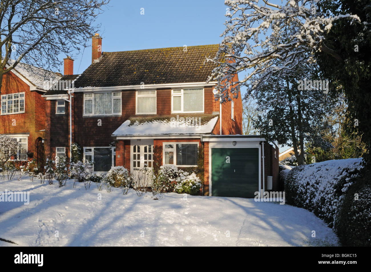 1960’s suburban detached four bedroomed house Lichfield Staffordshire on snowy winter’s day 2010 Stock Photo