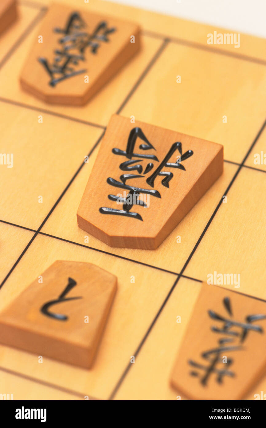 Japanese chess pieces on board close up Stock Photo Alamy