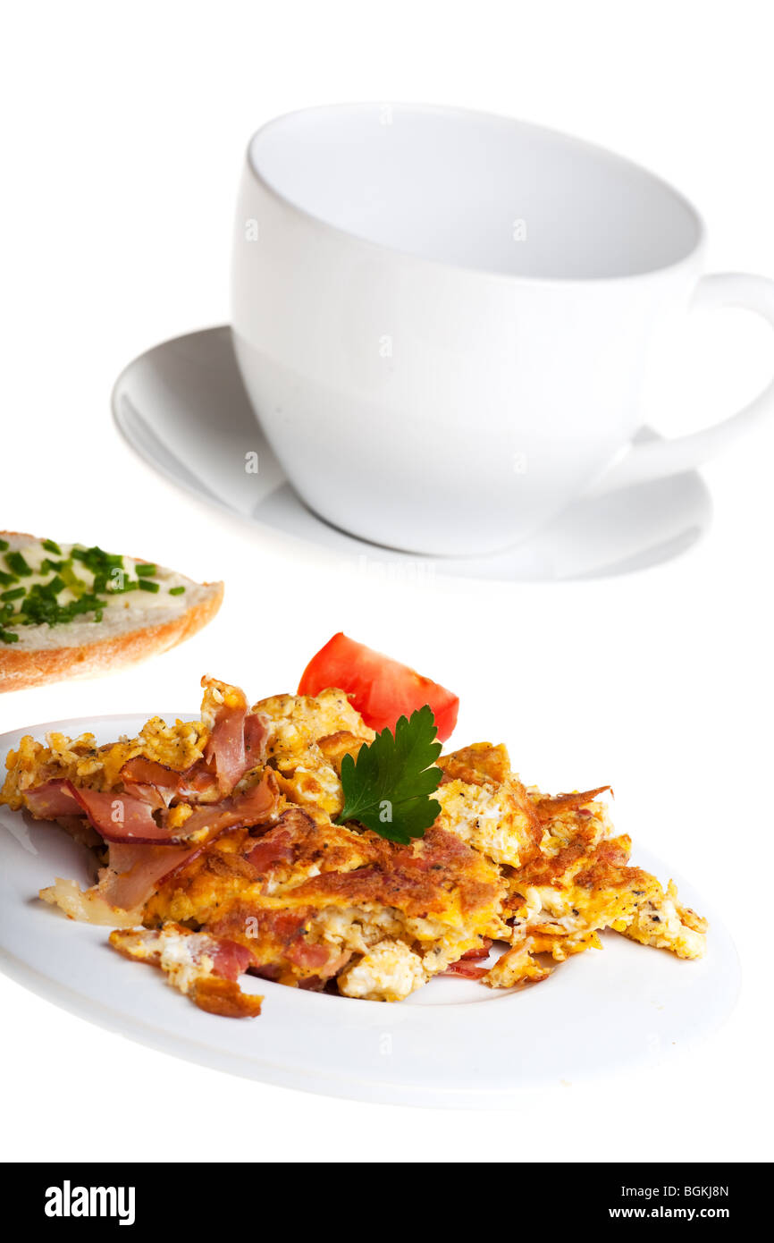 scrambled eggs and bun on a plate isolated on white Stock Photo - Alamy