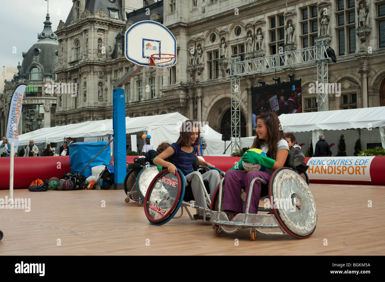 Paris, FRANCE -  Handicapped Sports, Girls in Wheelchairs, Playing Basketball Outdoors. School Sports Day, special needs exercise Stock Photo