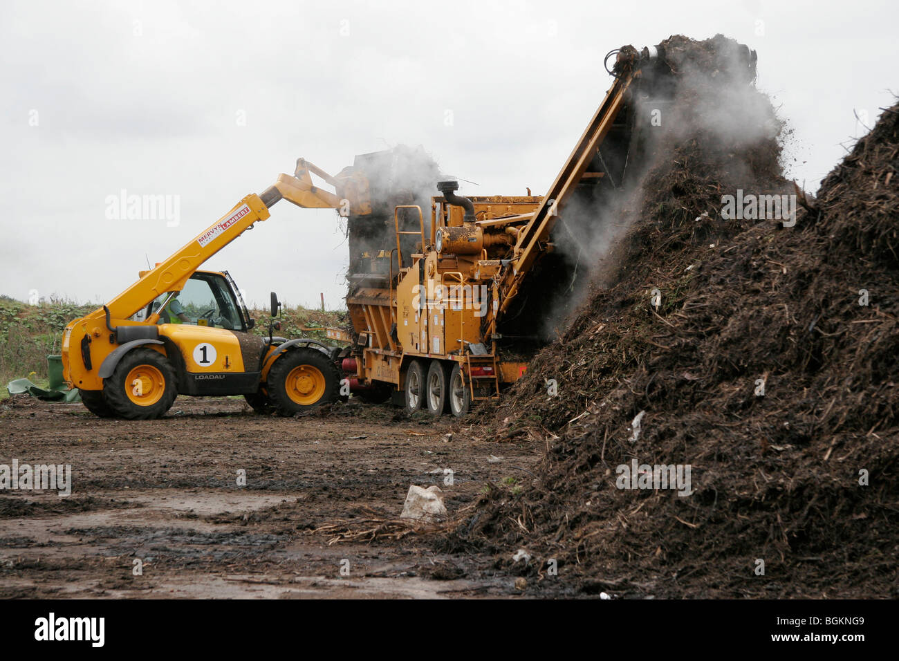 Recycling Garden Waste Into Compost To Be Used On Farm Land Stock Photo