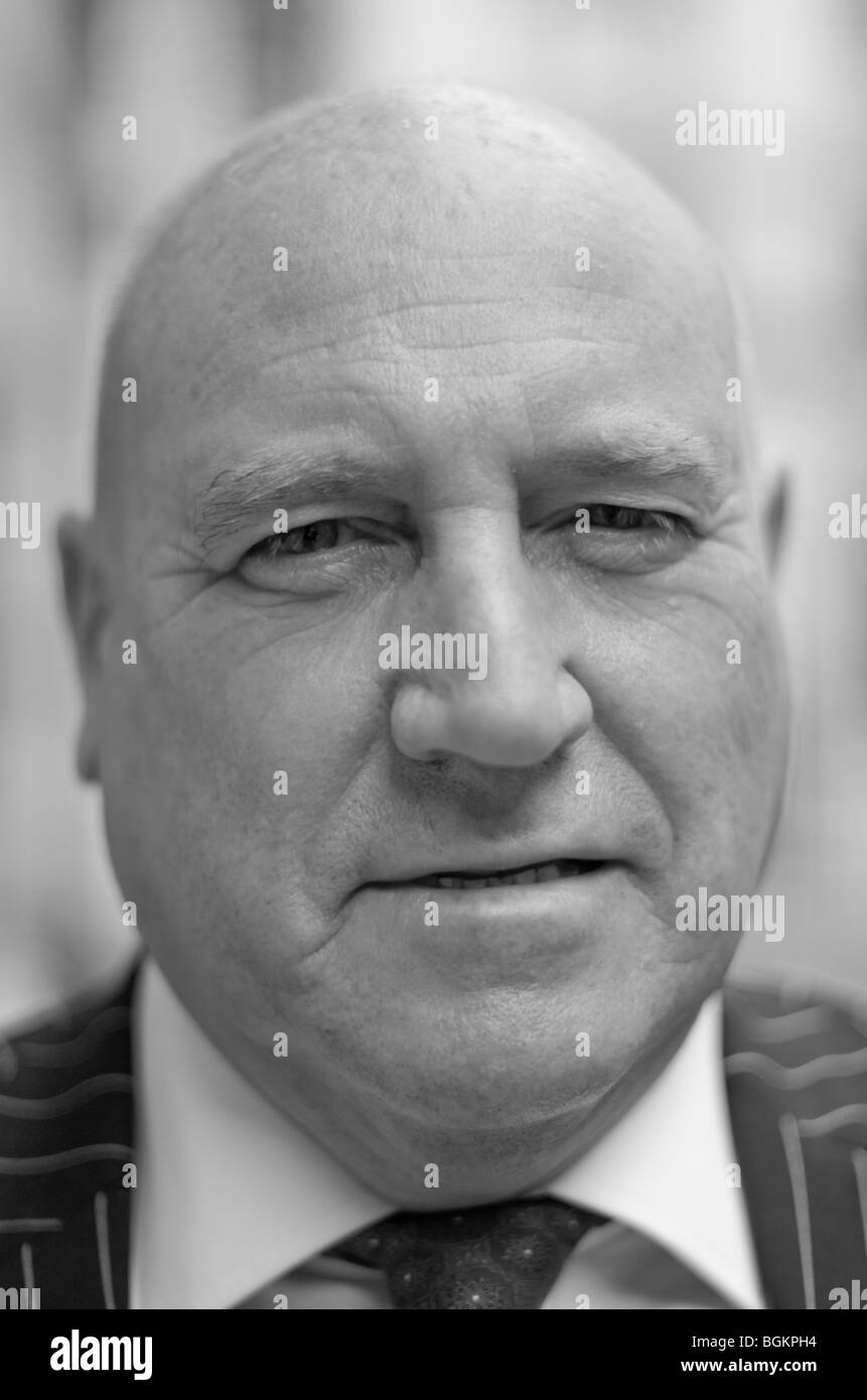 Faces of London- white middle aged bald man photographed in St James's London uk Stock Photo