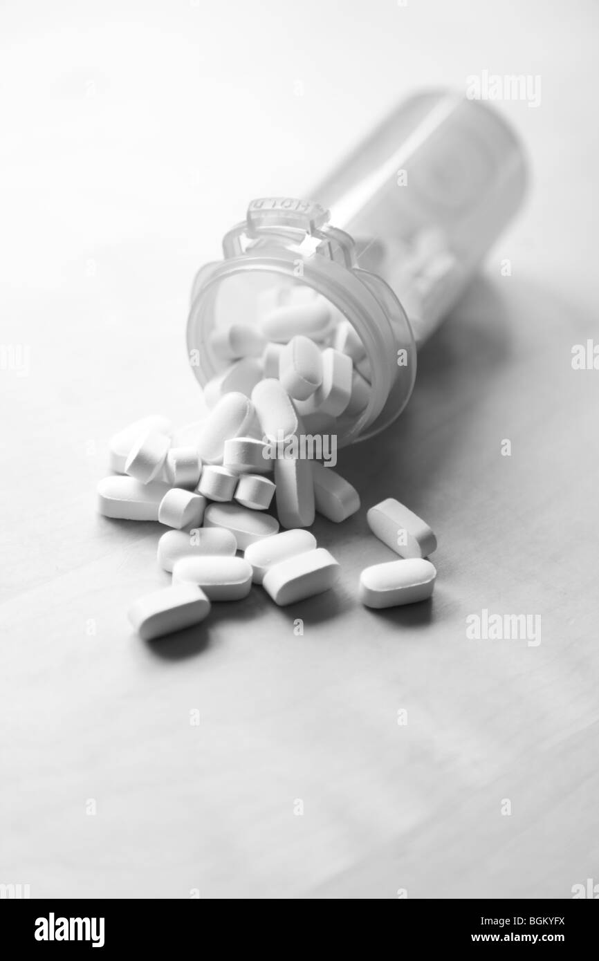 Bottle of pills in black and white Stock Photo